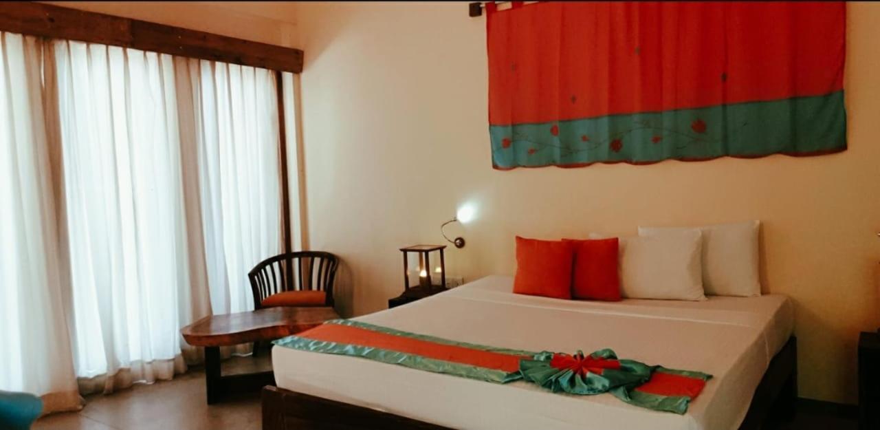 Giman Free Beach Resort Passikudah Exterior photo
